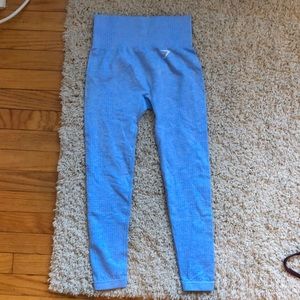 Blue leggings, never worn size small. Great condition